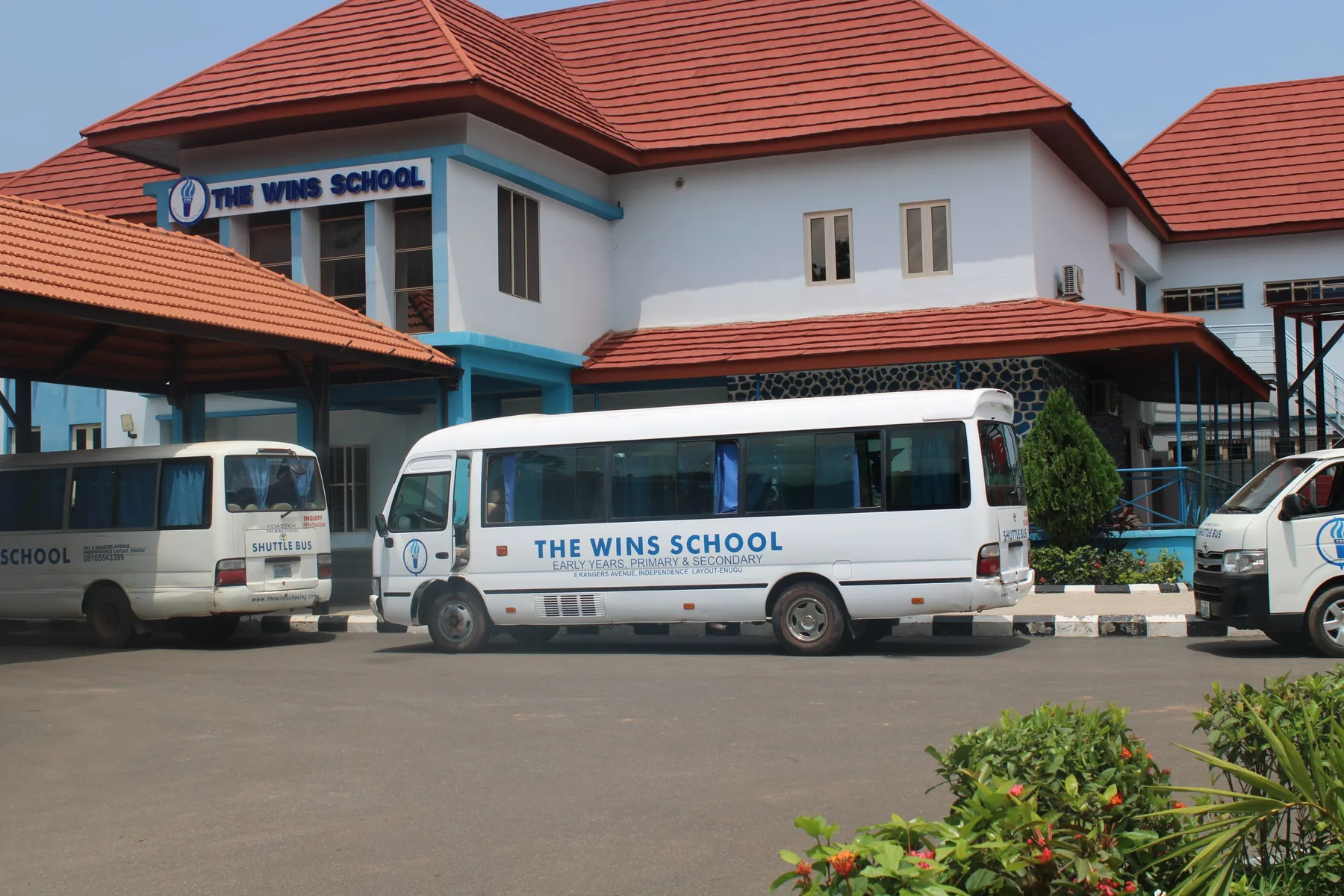 The Wins School campus and school buses